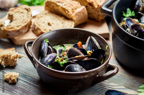 Mussels and fresh vegetables served at home