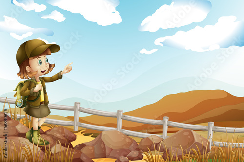 A female explorer at the rocky area