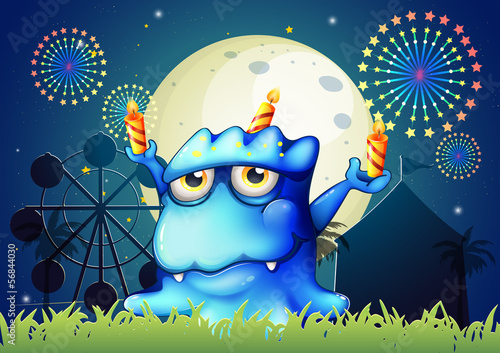 A carnival with a monster with three candles