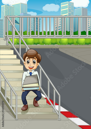 A smiling man at the stairs bringing a lot of documents