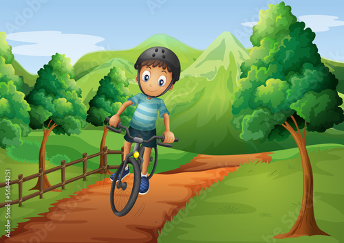 A boy biking going to the farm