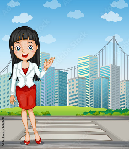 A pretty woman presenting the tall buildings