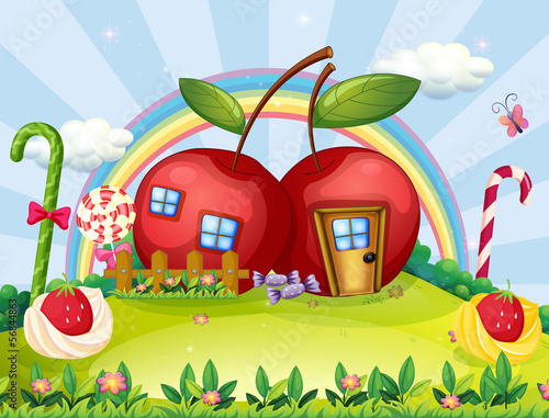 A hilltop with two apple houses and a rainbow