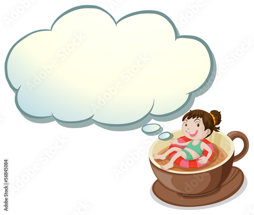 A girl enjoying inside the big cup