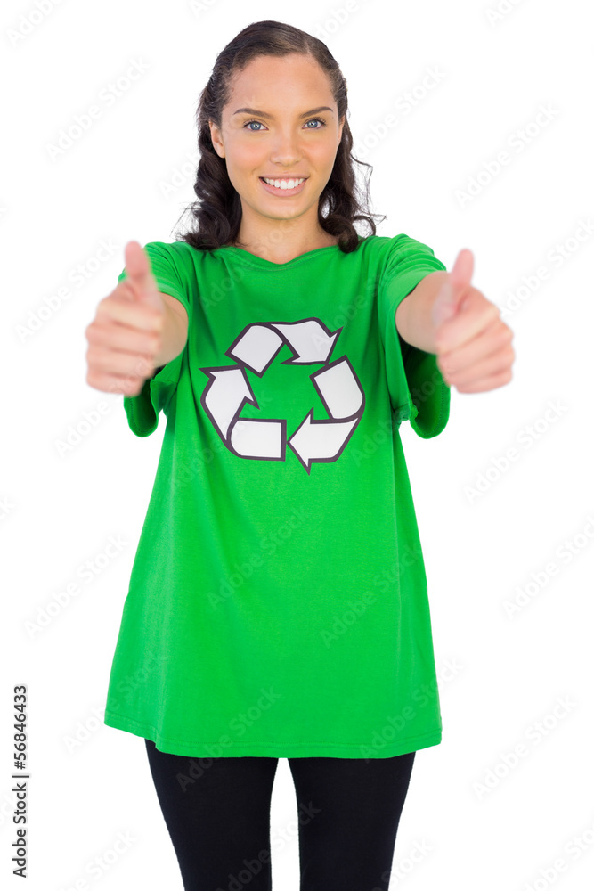Women wearing green recycling tshirt giving thumbs up Women wearing green recycling tshirt giving thumbs up