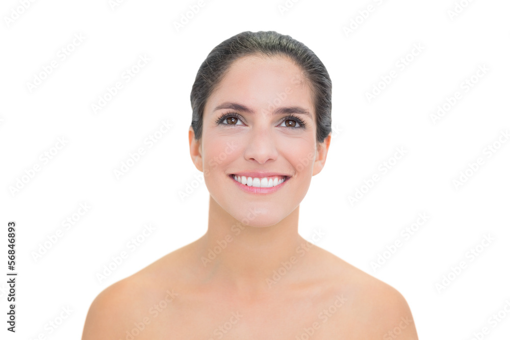 Smiling bare brunette looking up Smiling bare brunette looking up