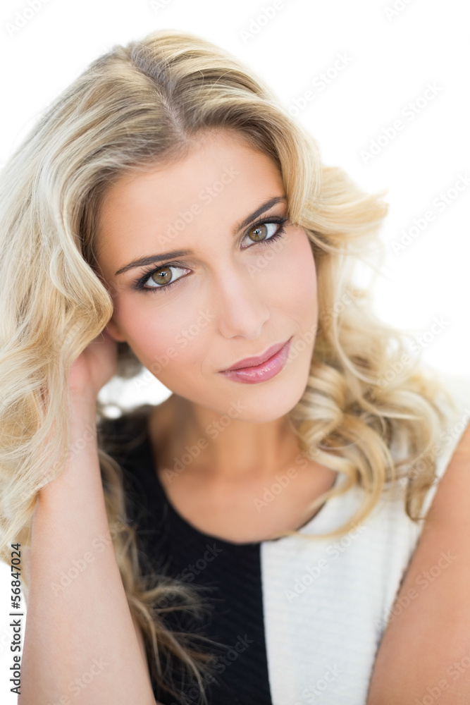 Smiling attractive blonde model looking at camera Smiling attractive blonde model looking at camera