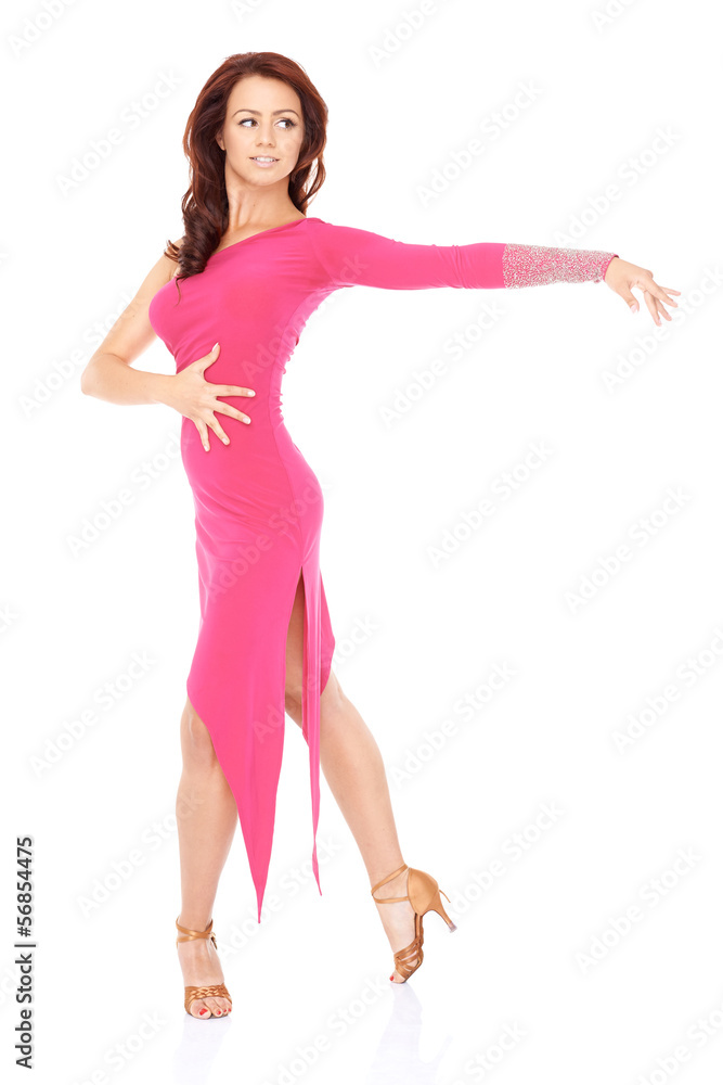Vivacious woman dancing in a sexy pink dress Vivacious woman dancing in a sexy pink dress