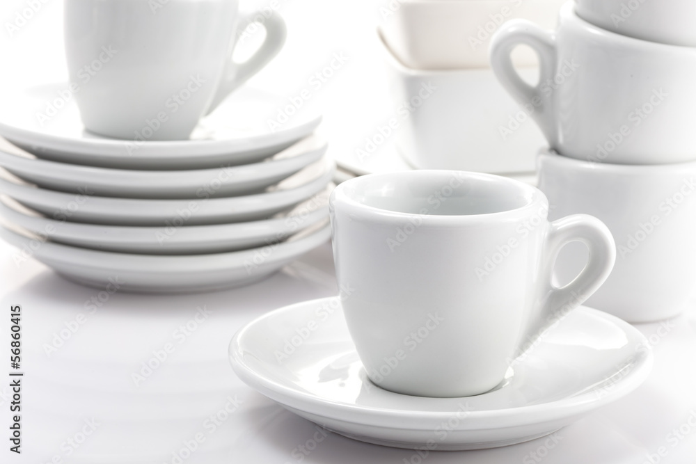 espresso cups and saucers isolated on a white background espresso cups and saucers isolated on a white background