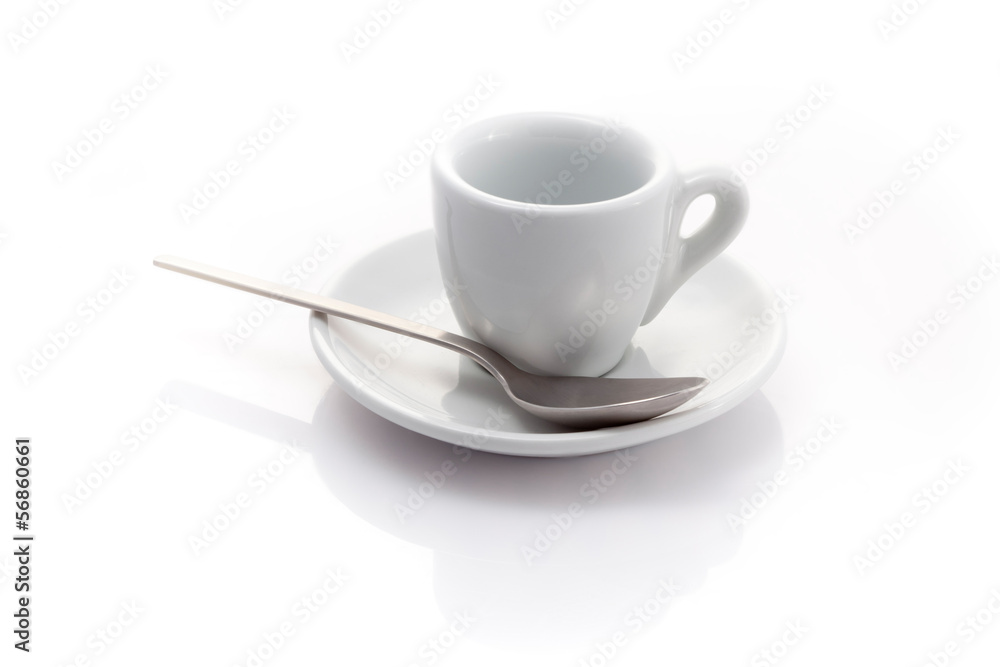 empty espresso cup with a spoon isolated on a white background empty espresso cup with a spoon isolated on a white background