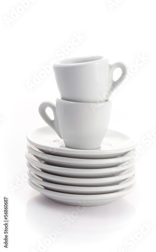 two espresso cups and saucers isolated on a white background