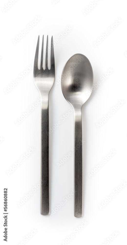 stainless steel fork and spoon isolated on a white background stainless steel fork and spoon isolated on a white background