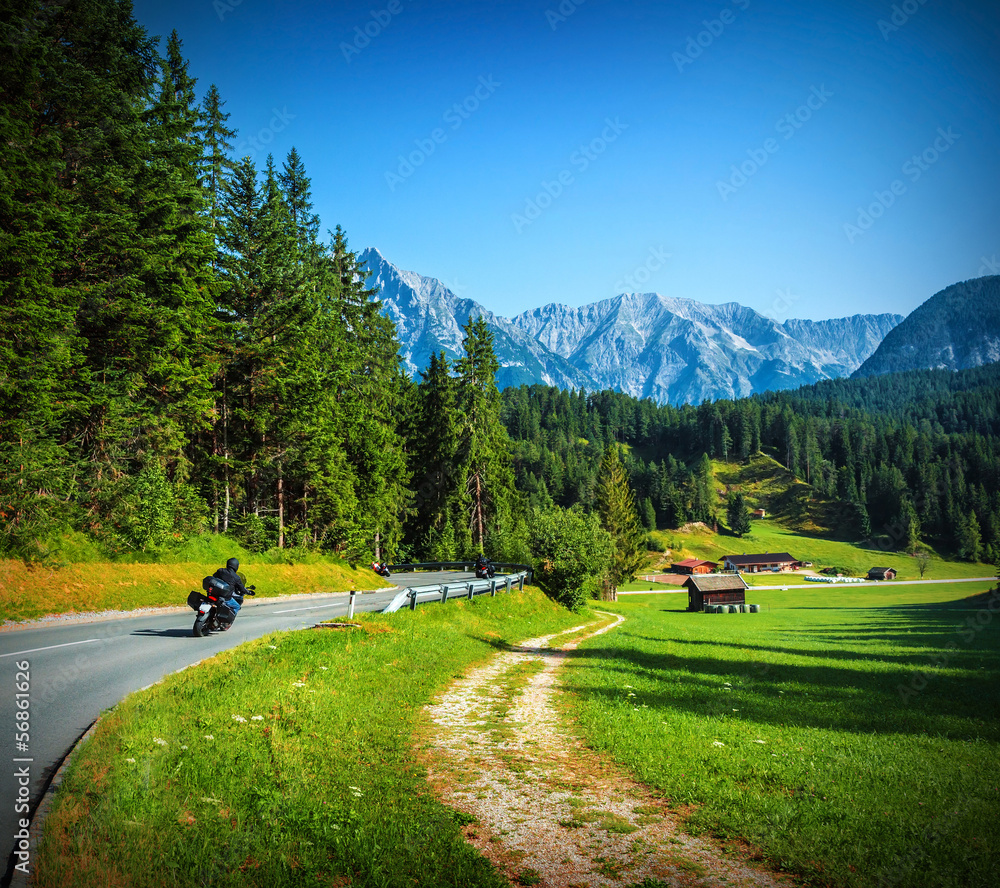 Bikers on mountainous road