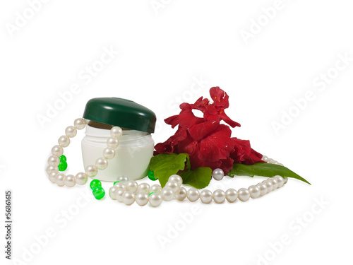 Cosmetic cream pearls and rose.