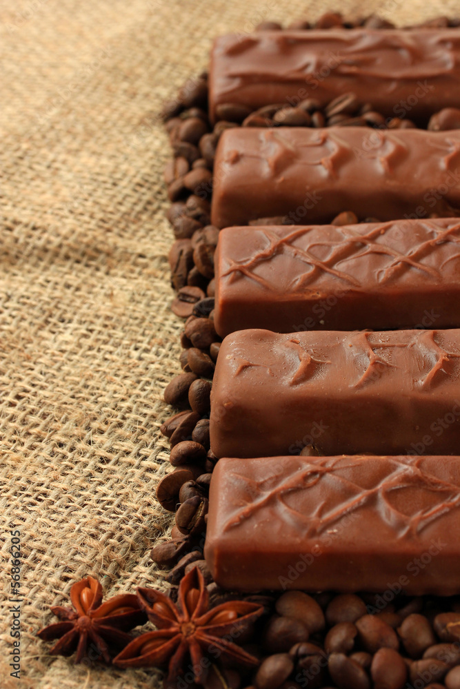 Delicious chocolate bars with coffee beans Delicious chocolate bars with coffee beans