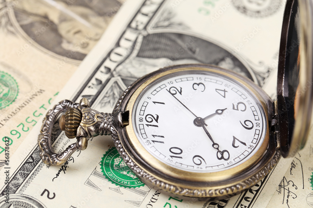 Pocket watch with financial assets.