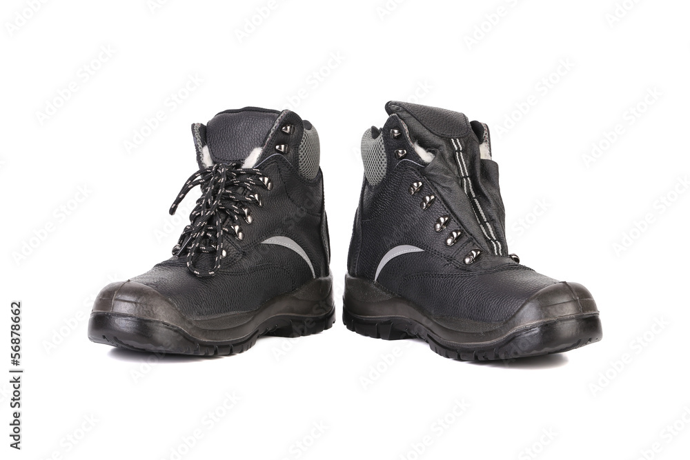 Black man's boots with gray bar.