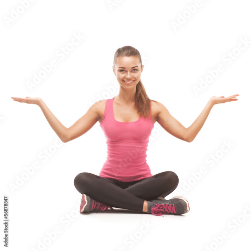 Smiling beautiful woman doing exercise