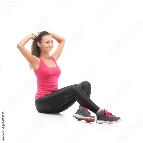 Smiling beautiful woman doing exercise