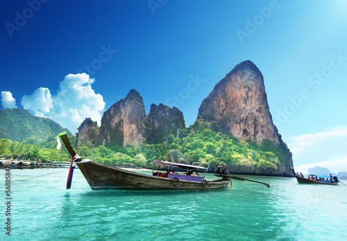 boats on Railay beach in Krabi Thailand photo