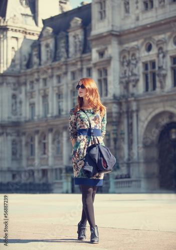 Style girl near retro building in Paris © Masson
