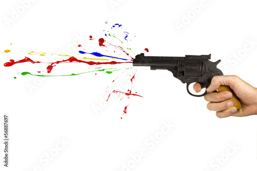 Toy gun shooting multicolor paint