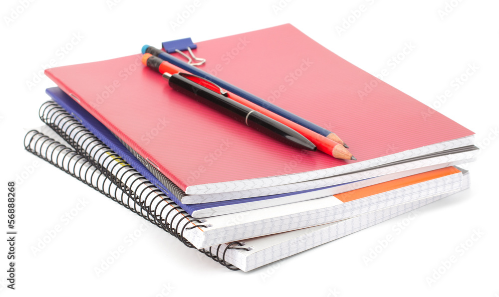 Notebook stack and pencils. Schoolchild and student studies acce Notebook stack and pencils. Schoolchild and student studies acce