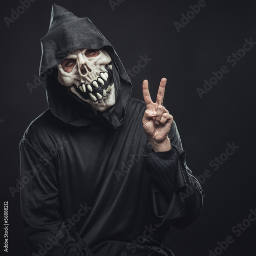 skeleton showing two fingers