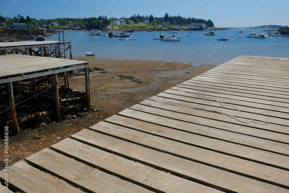 New wooden lobster boat dock low tide