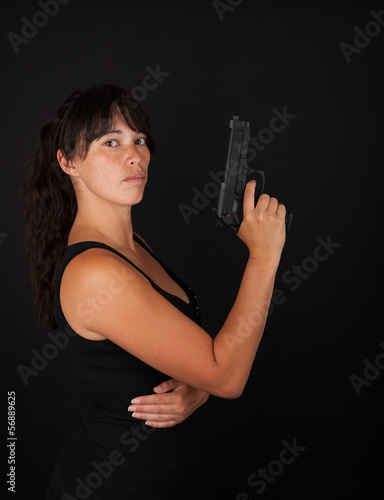 Woman holding a gun