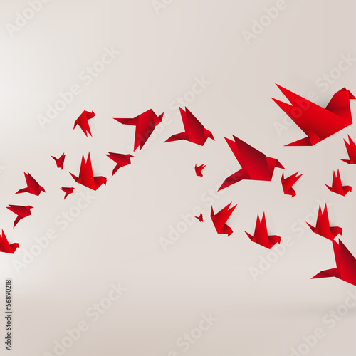 Origami paper bird on abstract background