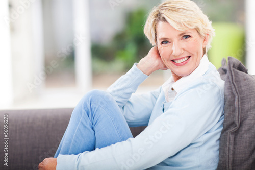 middle aged woman relaxing at home