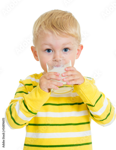 Kid boy drinking yoghurt fr...
