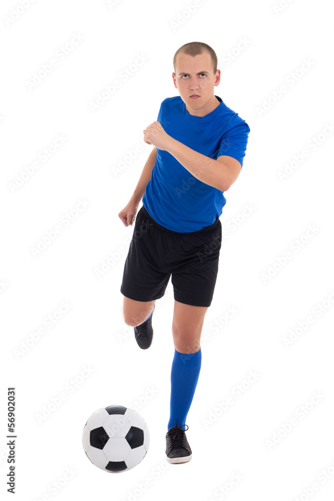 young attractive soccer player in blue kicking ball isolated on young attractive soccer player in blue kicking ball isolated on