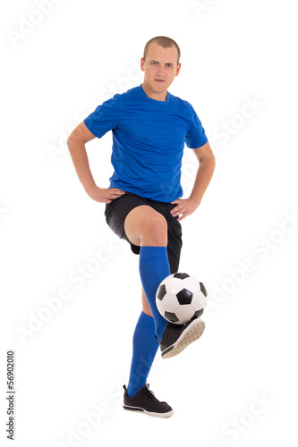 soccer player in blue uniform making trick with ball isolated on © Di Studio