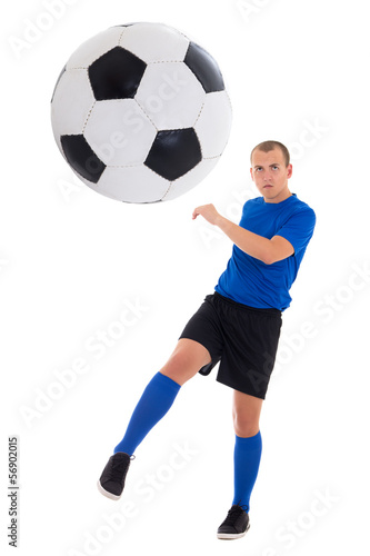 soccer player in blue kicking ball isolated on white background