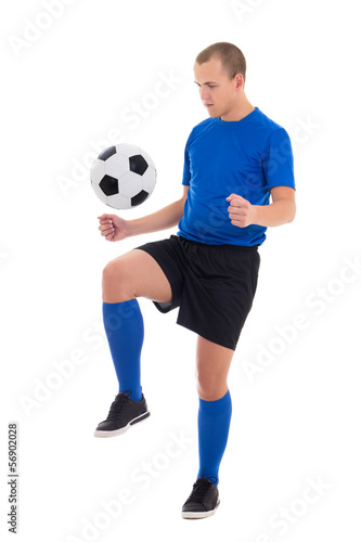 soccer player in blue uniform playing with ball isolated on whit