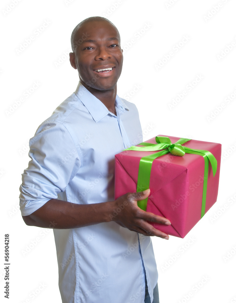 Handsome african guy with a christmas gift
