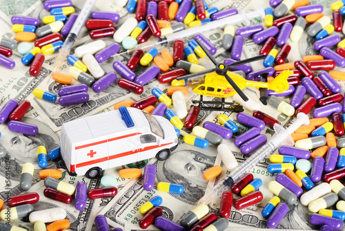 Ambulance car and helicopter toys through pills and dollars