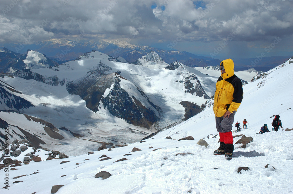 Mountaineer looking at view in Andes