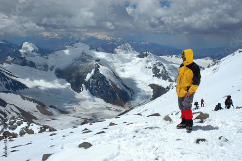 Mountaineer looking at view in Andes