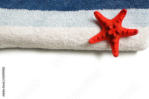 Blue towel with red starfish isolated on white background