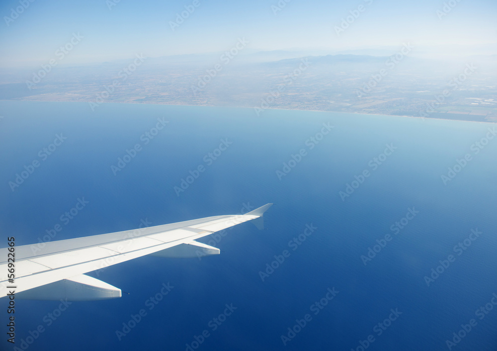 Fototapeta premium Airplane wing out of window