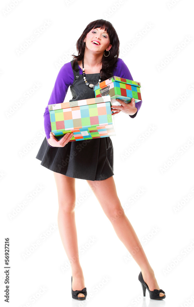Young woman with colorful boxes isolated Young woman with colorful boxes isolated