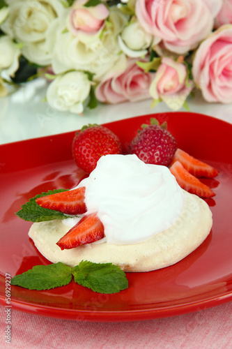 Tasty meringue cake with berries, close up © Africa Studio