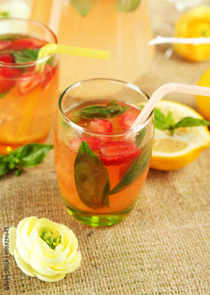 Basil lemonade with strawberry in jug and glass, Basil lemonade with strawberry in jug and glass,
