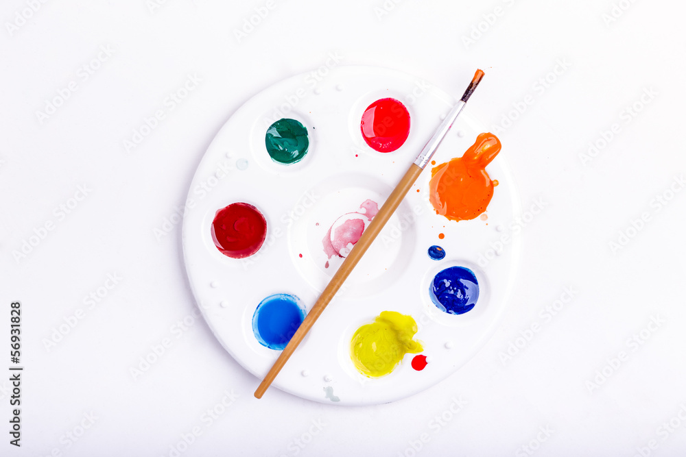 Palette and brushes.Paintbrush and palette on white. Palette and brushes.Paintbrush and palette on white.