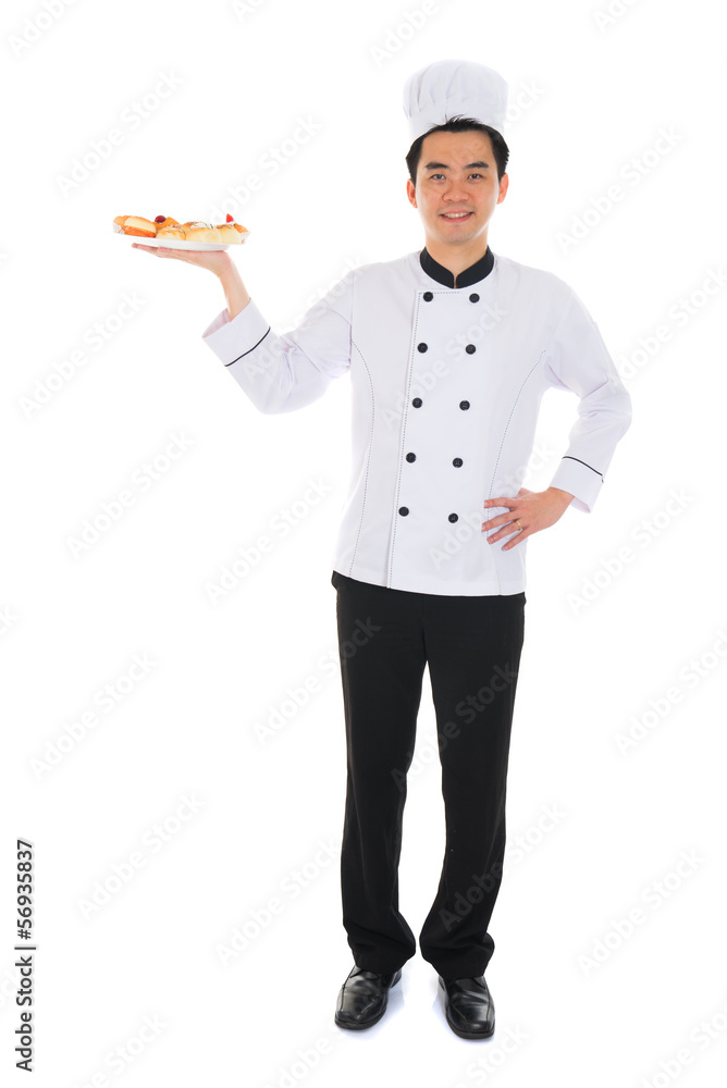 Portrait of confident male chef smiling isolated on white backgr Portrait of confident male chef smiling isolated on white backgr