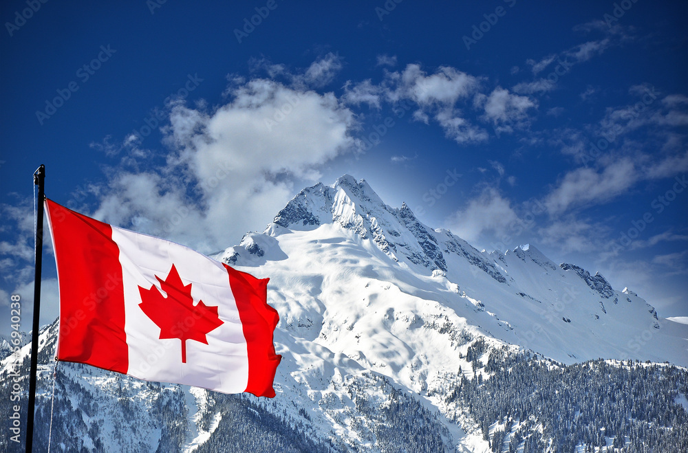 Obraz premium Canadian flag and beautiful mountain landscape