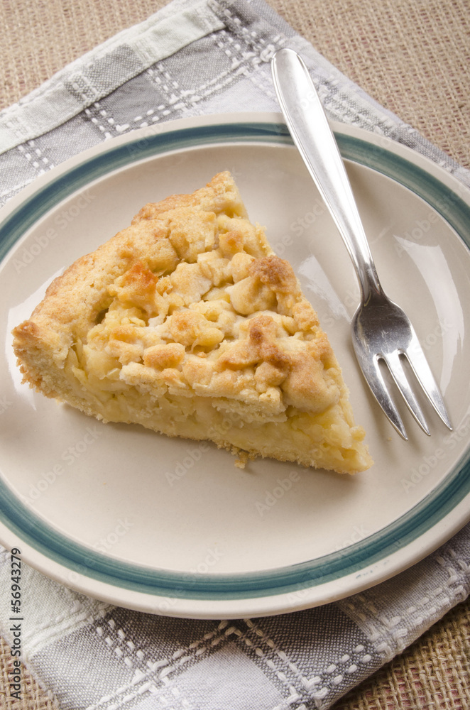 freshly baked crumb cake on a plate
